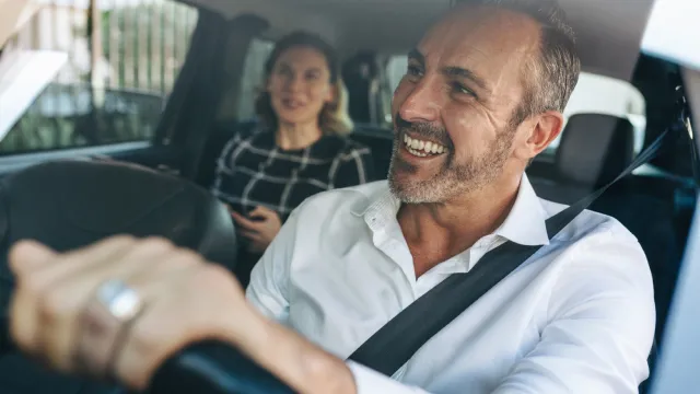 Taxi driver in car