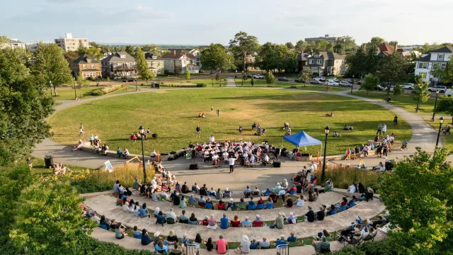 Residents listening to live music at Victoria Park