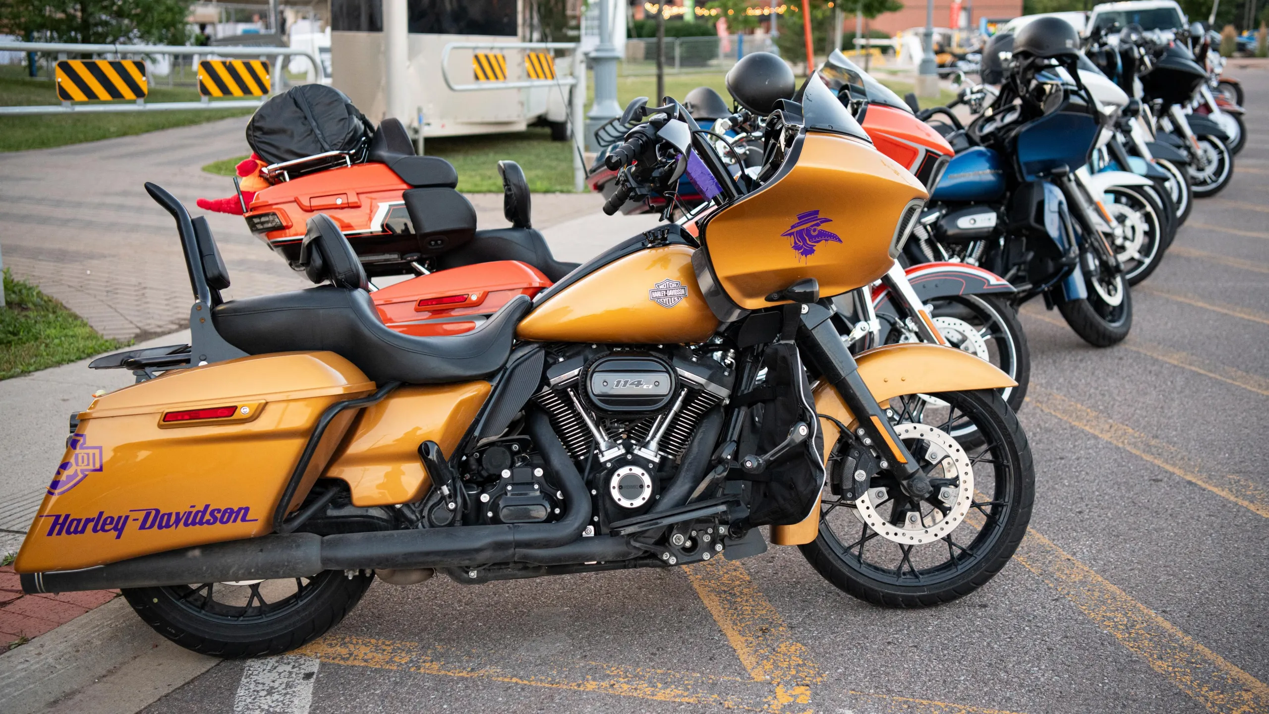 Motorcycles lined up at a festival
