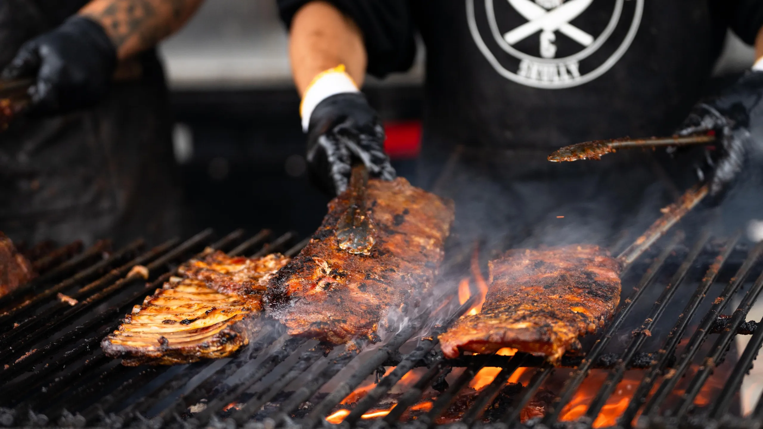 Ribs cooking on the grill at RibFest
