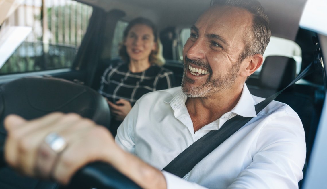 Taxi driver in car